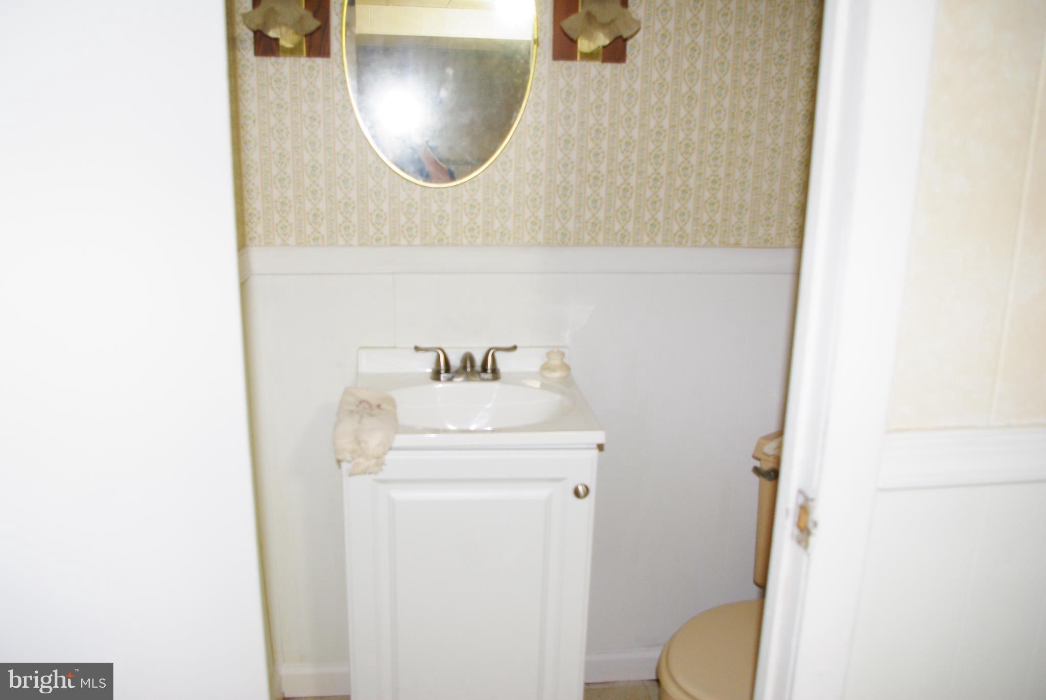 103 Embleton Road Owings Mills, MD 21117 - Photo 22 of 27 Half Bathroom in Basement