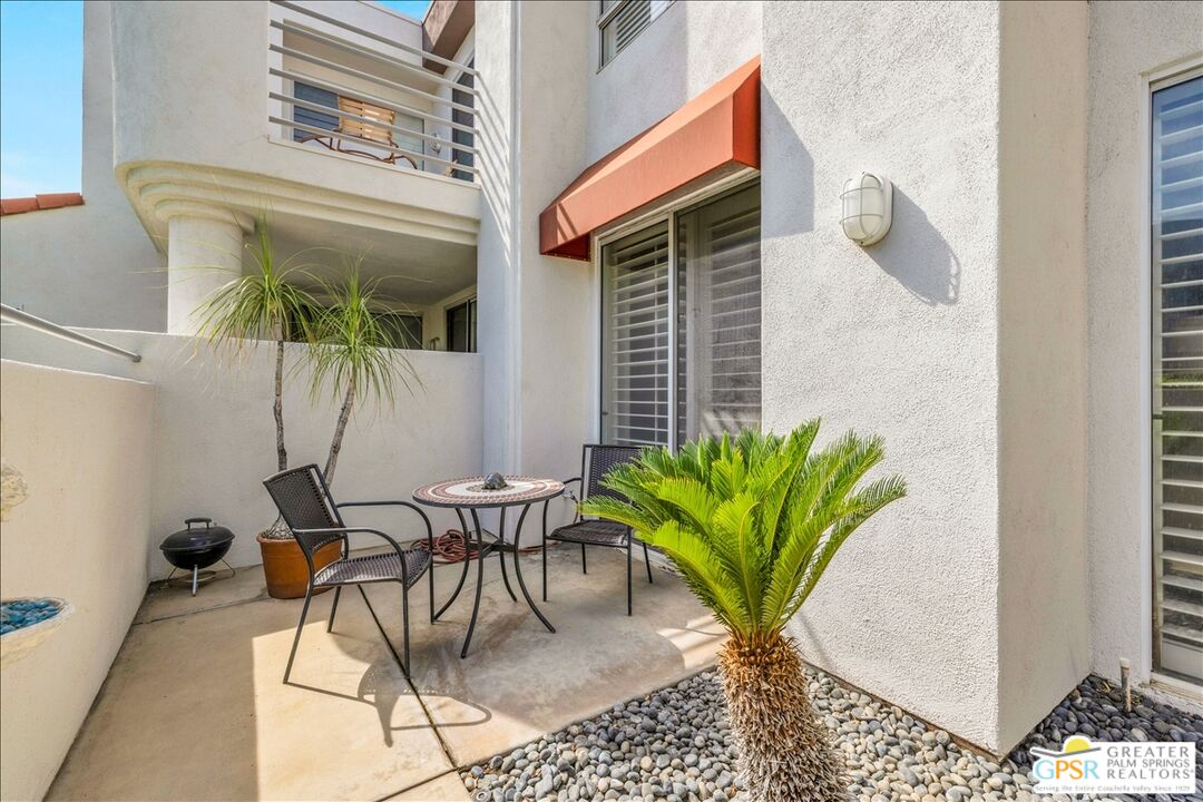 401 El Cielo Road, Unit 227 Palm Springs, CA 92262 - Photo 21 of 43 a view of a potted plants in front of a door
