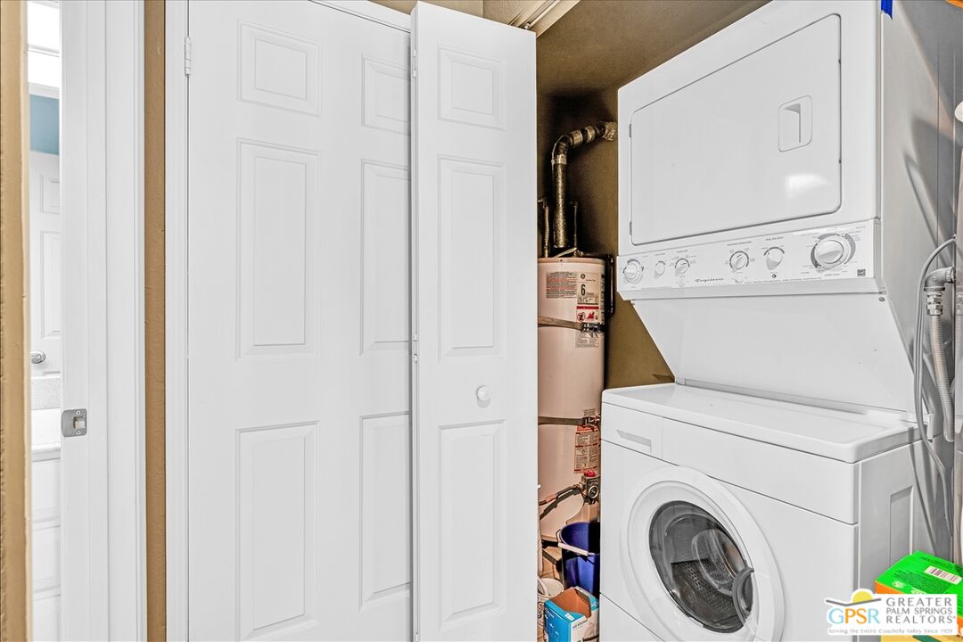 401 El Cielo Road, Unit 227 Palm Springs, CA 92262 - Photo 22 of 45 a utility room with dryer and washer