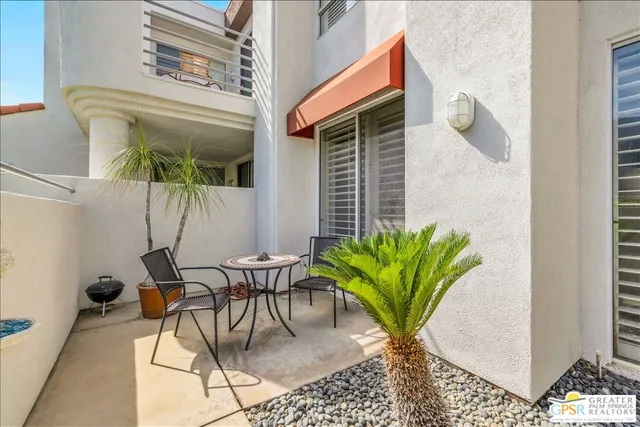 a view of a potted plants in front of a door