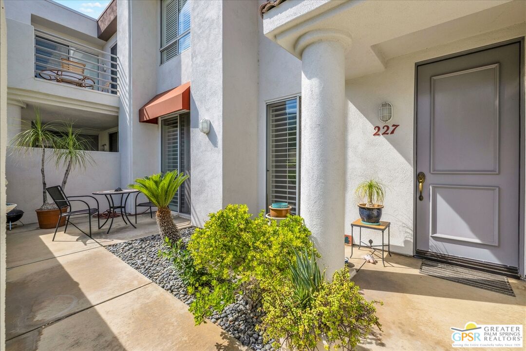 401 El Cielo Road, Unit 227 Palm Springs, CA 92262 - Photo 27 of 43 a view of a house with a patio