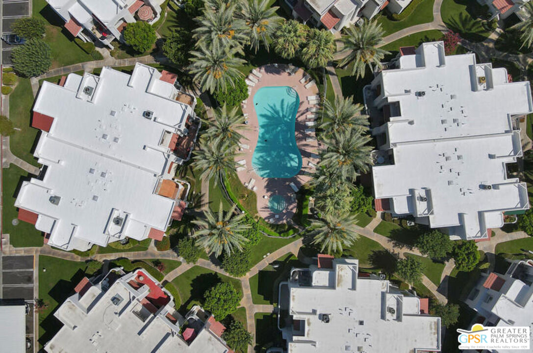 401 El Cielo Road, Unit 227 Palm Springs, CA 92262 - Photo 38 of 45 an aerial view of a house with a yard