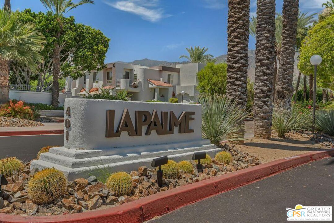 401 El Cielo Road, Unit 227 Palm Springs, CA 92262 - Photo 40 of 43 a view of a street with a building in the background