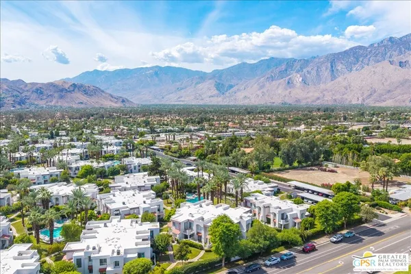 an aerial view of residential houses and outdoor space