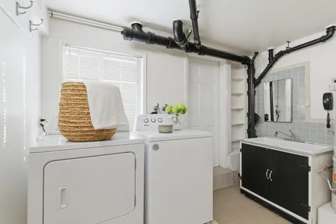a bathroom with a sink and mirror