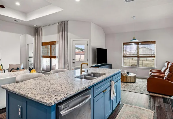 a kitchen with granite countertop sink and a granite counter tops