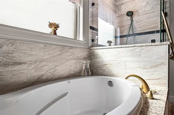 a bathroom with a bathtub