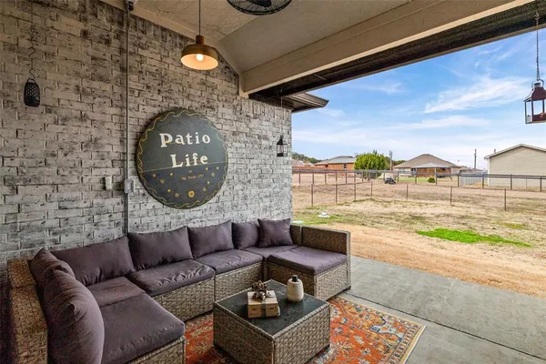 a living room with furniture and a table