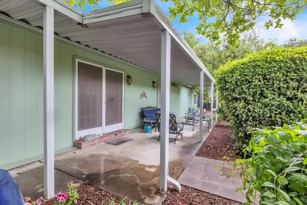 a view of a house with patio