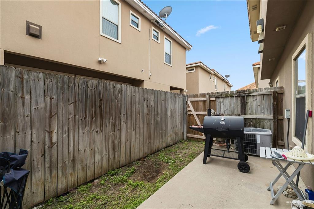 3005 South L Street, Unit 3 McAllen, TX 78503 - Photo 14 of 14 a balcony with chairs and a table