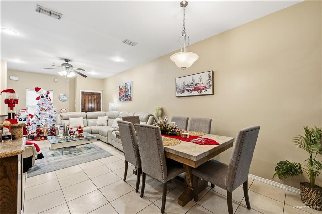 3005 South L Street, Unit 3 McAllen, TX 78503 - Photo 4 of 14 a view of a dining room with furniture