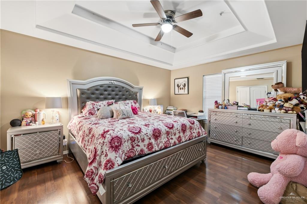 3005 South L Street, Unit 3 McAllen, TX 78503 - Photo 7 of 14 a bedroom with bed and window