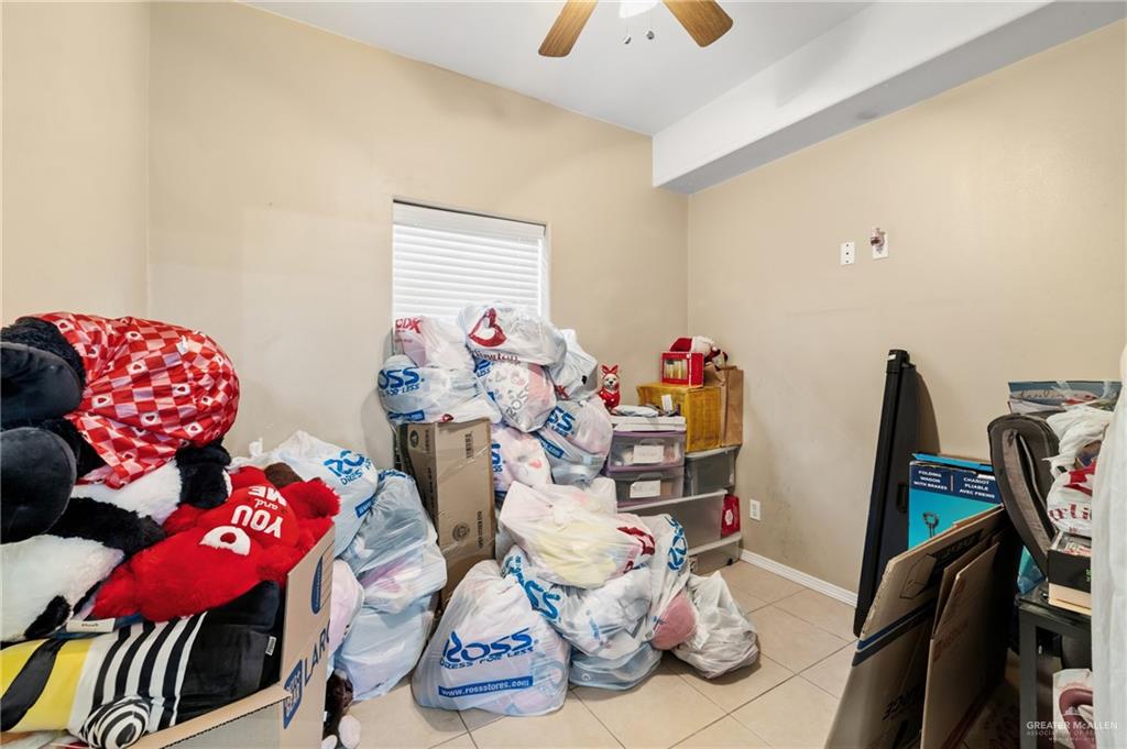 3005 South L Street, Unit 3 McAllen, TX 78503 - Photo 9 of 14 a living room with furniture and wooden floor