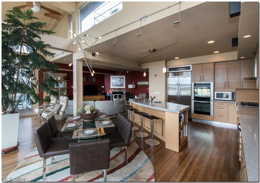 1237 Washington Avenue, Unit 1209 Cleveland, OH 44113 - Photo 9 of 33 Soaring 2 story penthouse gives bright and airy feel