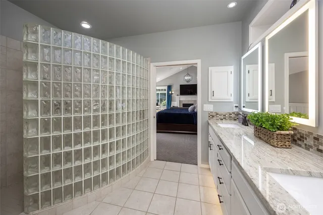 a kitchen with a sink and a stove top oven