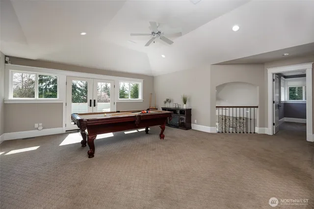 a reading room with furniture and a window