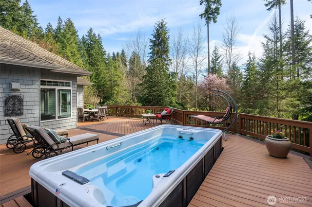 a view of a balcony with chairs