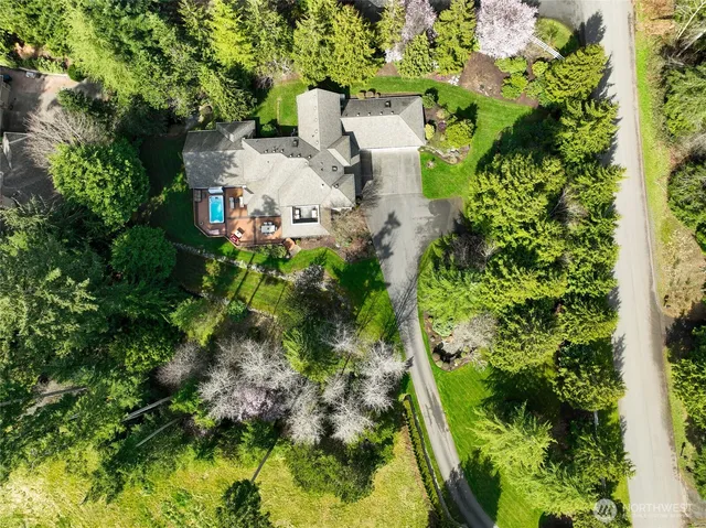 an aerial view of residential house with outdoor space