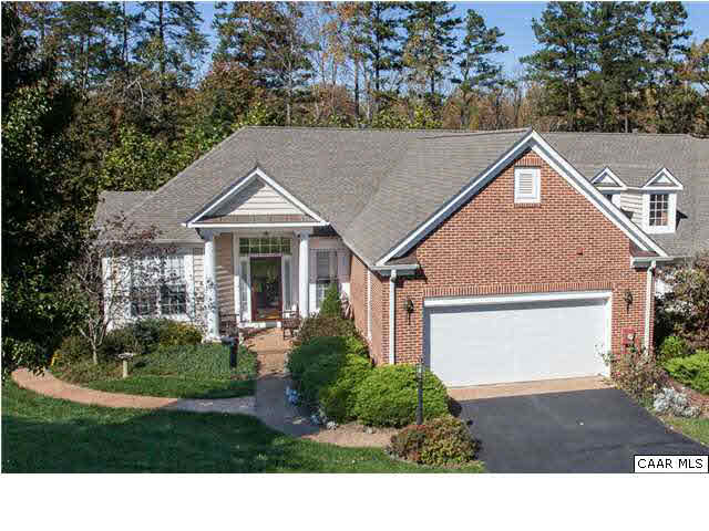 2127 Shepherds Ridge Road Charlottesville, VA 22901 - Photo 2 of 13 a front view of a house with a yard and garage
