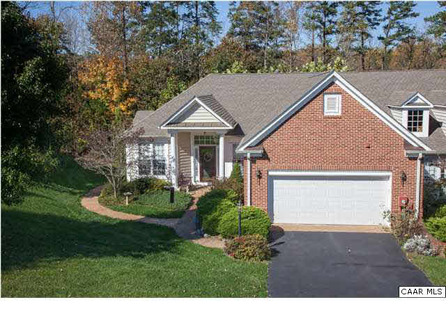 2127 Shepherds Ridge Road Charlottesville, VA 22901 - Photo 5 of 13 a house with green field in front of it