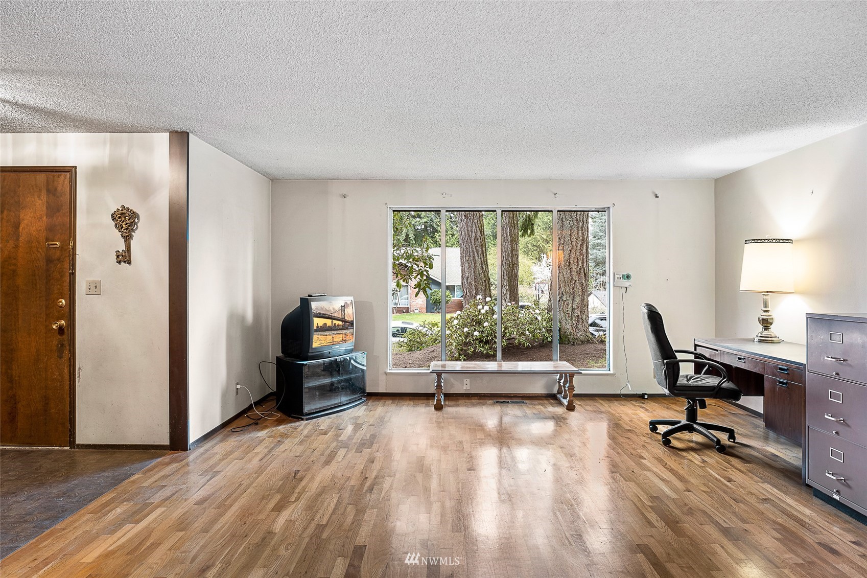 14332 118th Avenue Northeast Kirkland, WA 98034 - Photo 12 of 40 a view of workspace with wooden floor and windows