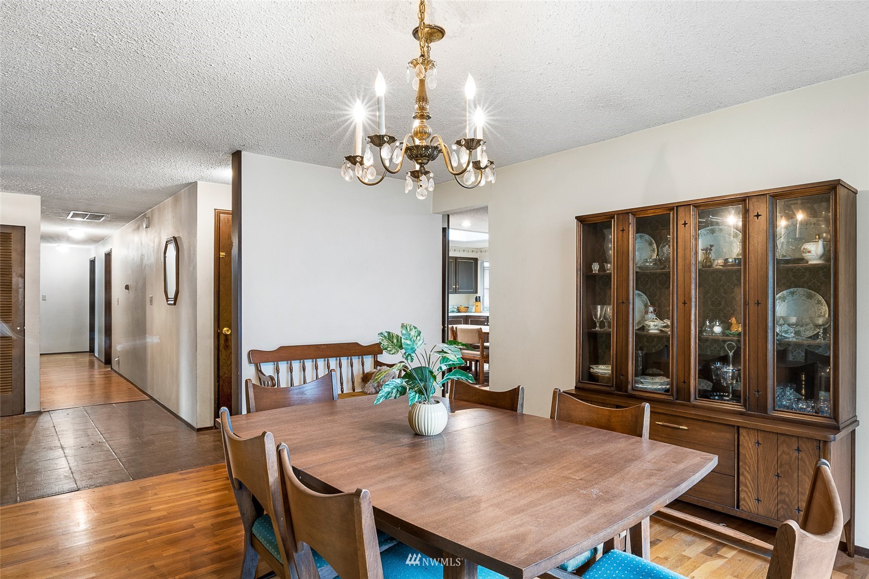 14332 118th Avenue Northeast Kirkland, WA 98034 - Photo 23 of 40 a view of a dining room with furniture window and wooden floor