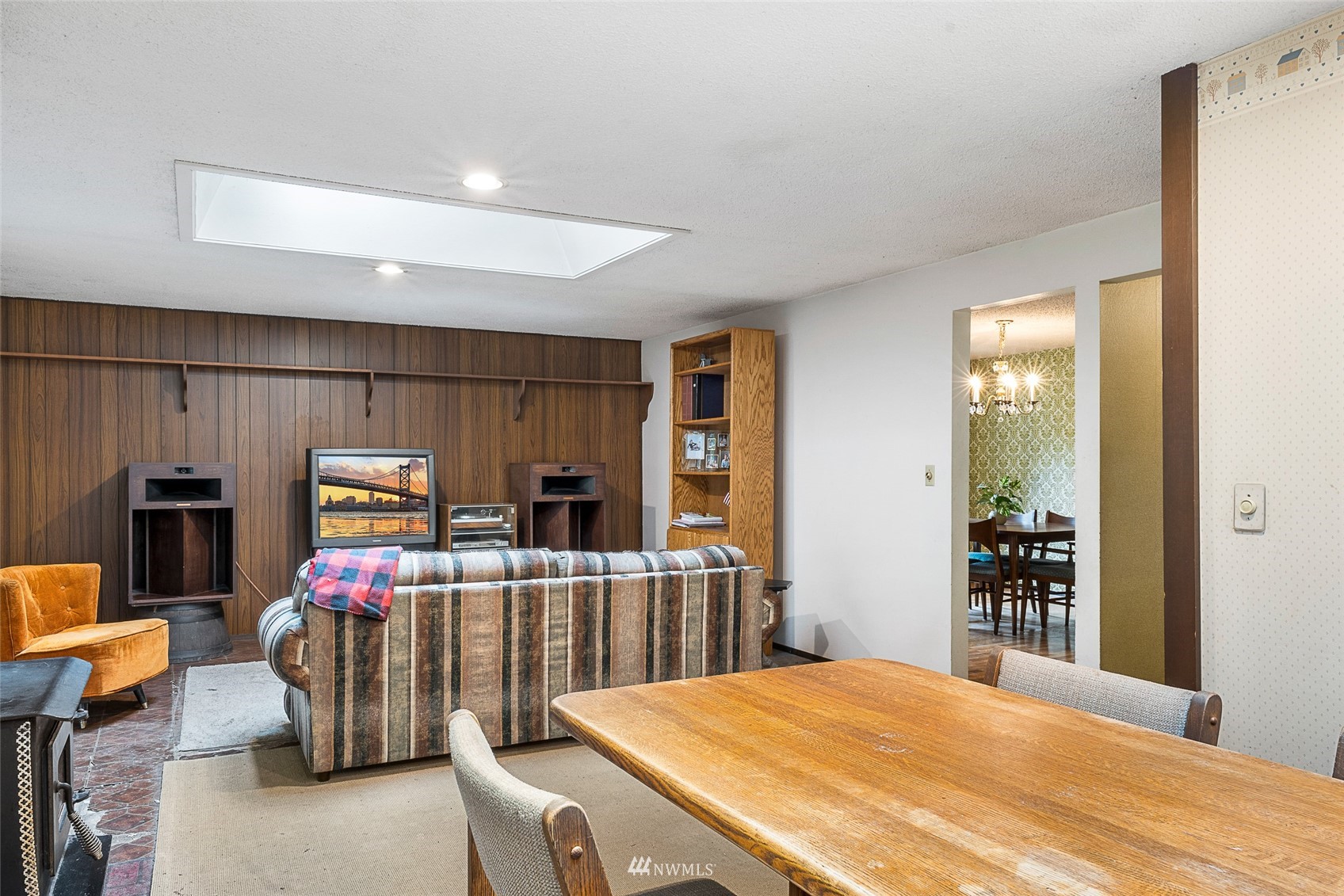 14332 118th Avenue Northeast Kirkland, WA 98034 - Photo 24 of 40 a kitchen with stainless steel appliances kitchen island granite countertop a refrigerator and a sink