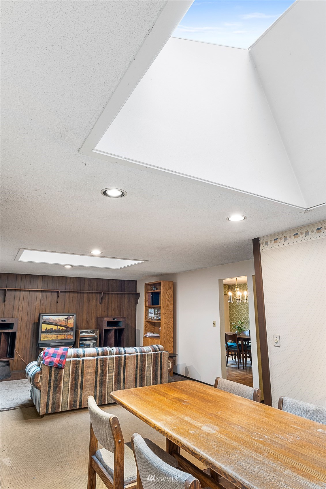 14332 118th Avenue Northeast Kirkland, WA 98034 - Photo 25 of 40 a living room with lots of furniture and kitchen view