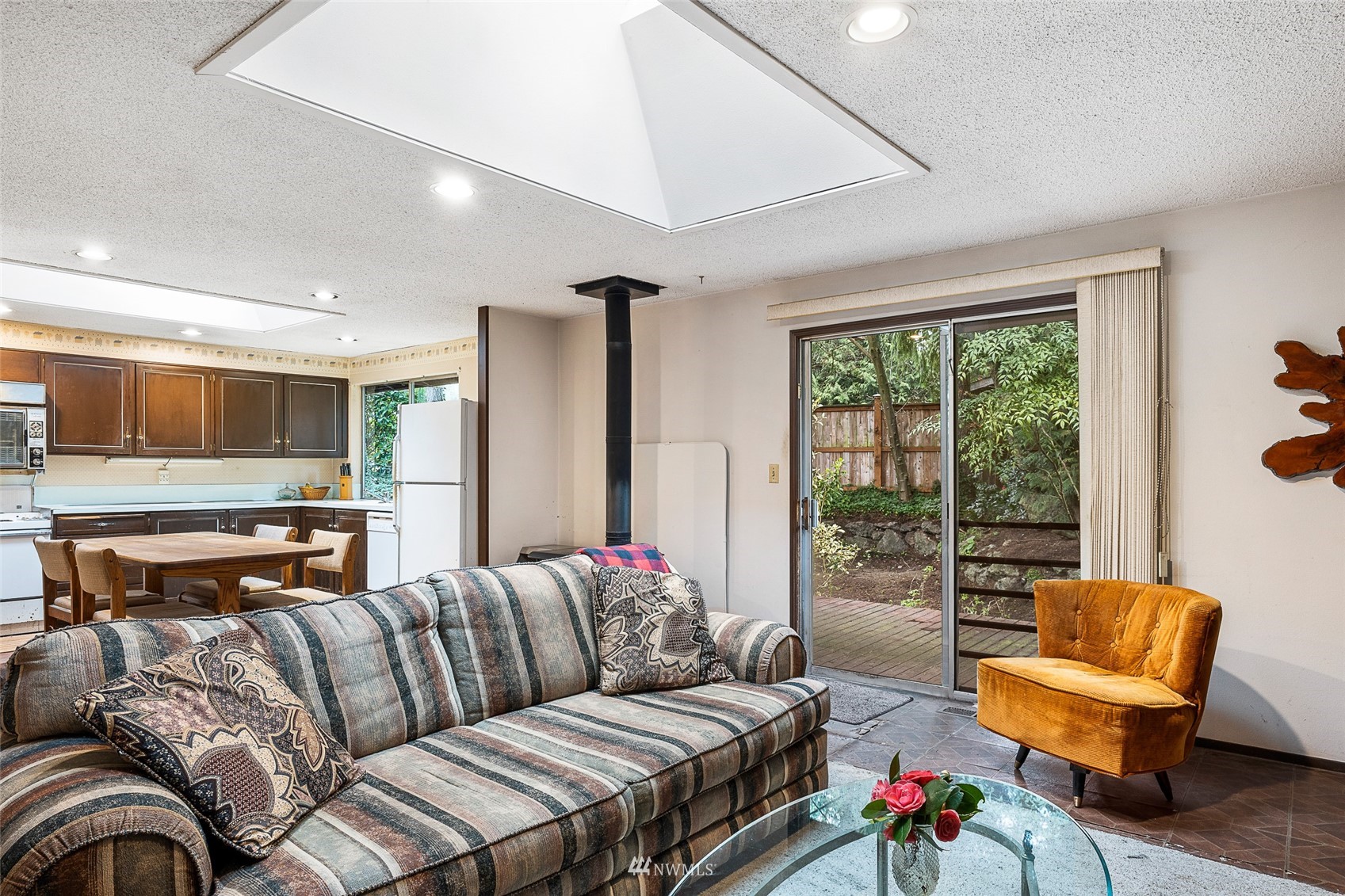 14332 118th Avenue Northeast Kirkland, WA 98034 - Photo 26 of 40 a living room with furniture and a large window