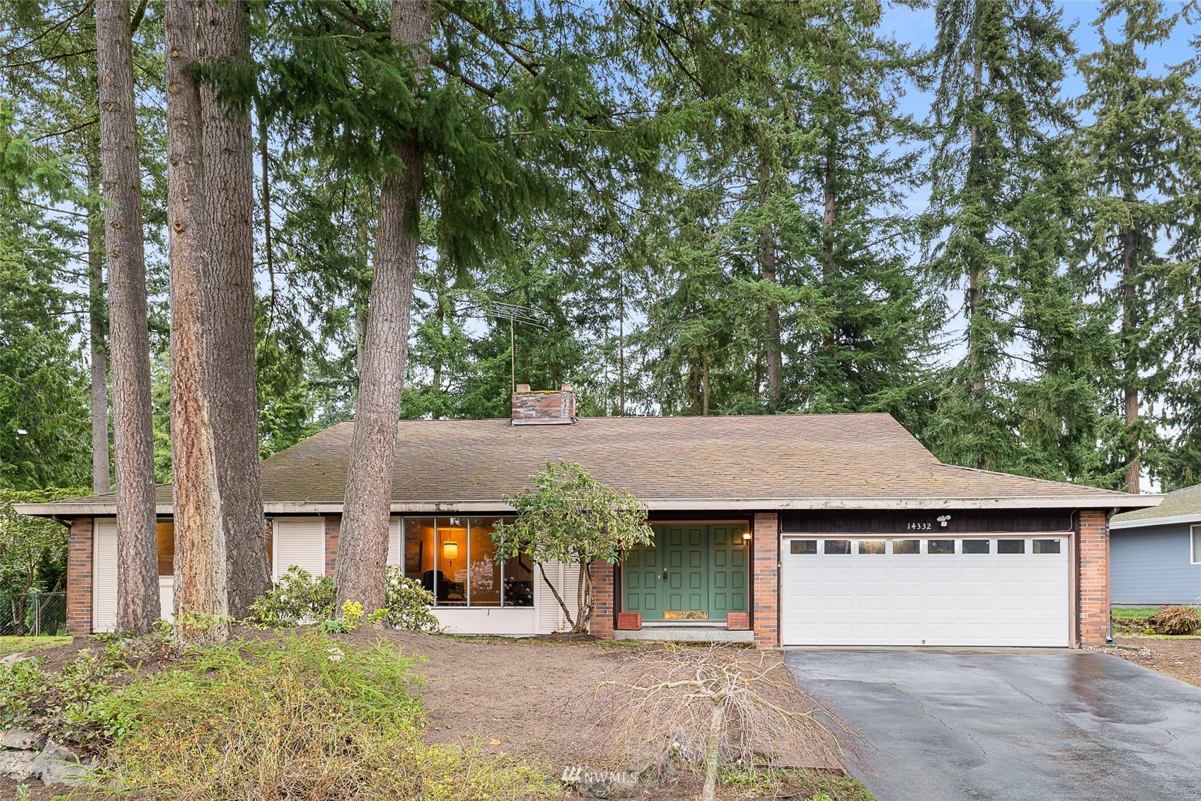 14332 118th Avenue Northeast Kirkland, WA 98034 - Photo 37 of 40 front view of a house with a tree