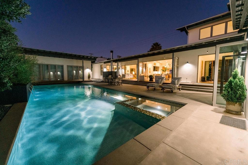 a view of a swimming pool with an outdoor space