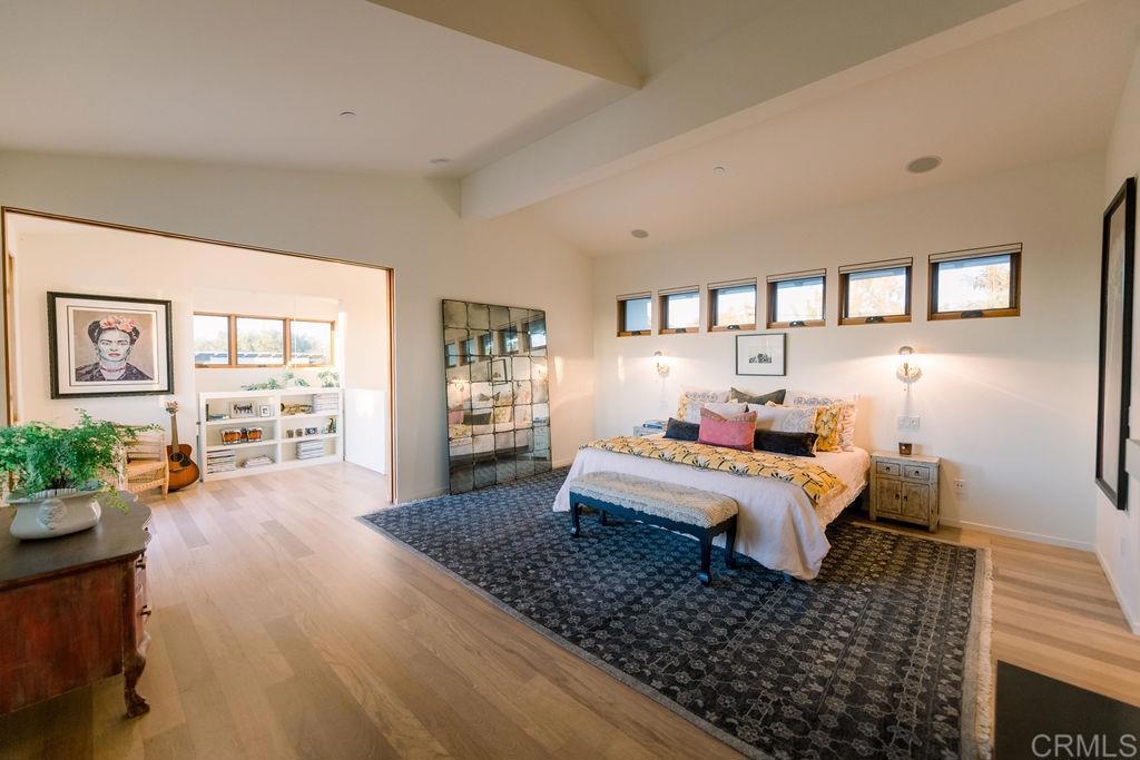 1866 Sheridan Road Encinitas, CA 92024 - Photo 15 of 25 a bed room with a bed and a couch