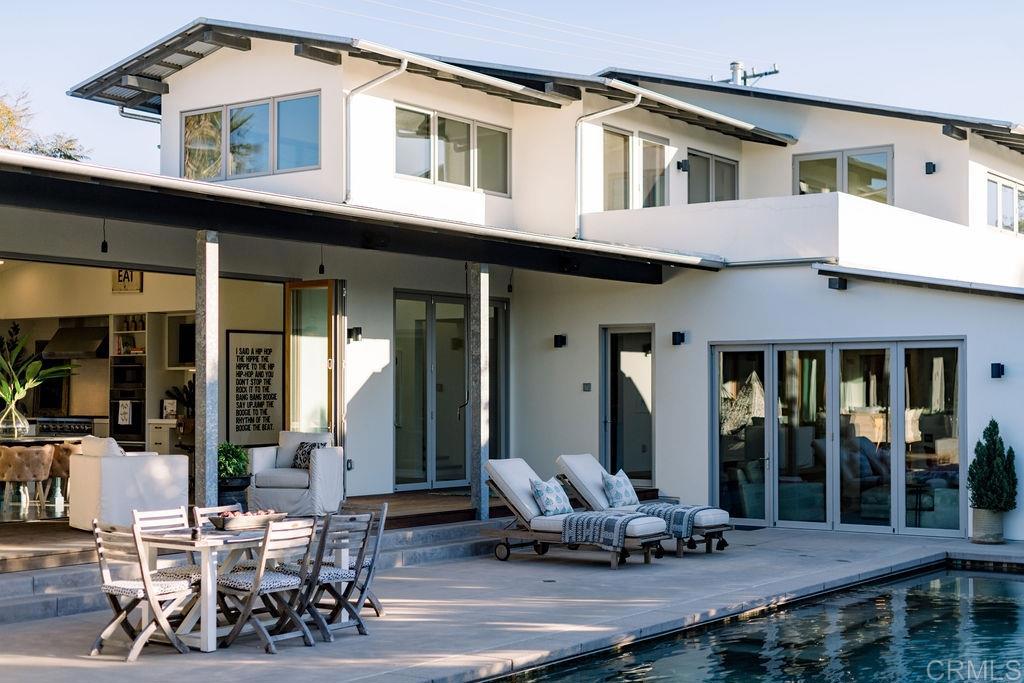 1866 Sheridan Road Encinitas, CA 92024 - Photo 20 of 25 a building outdoor space with patio furniture