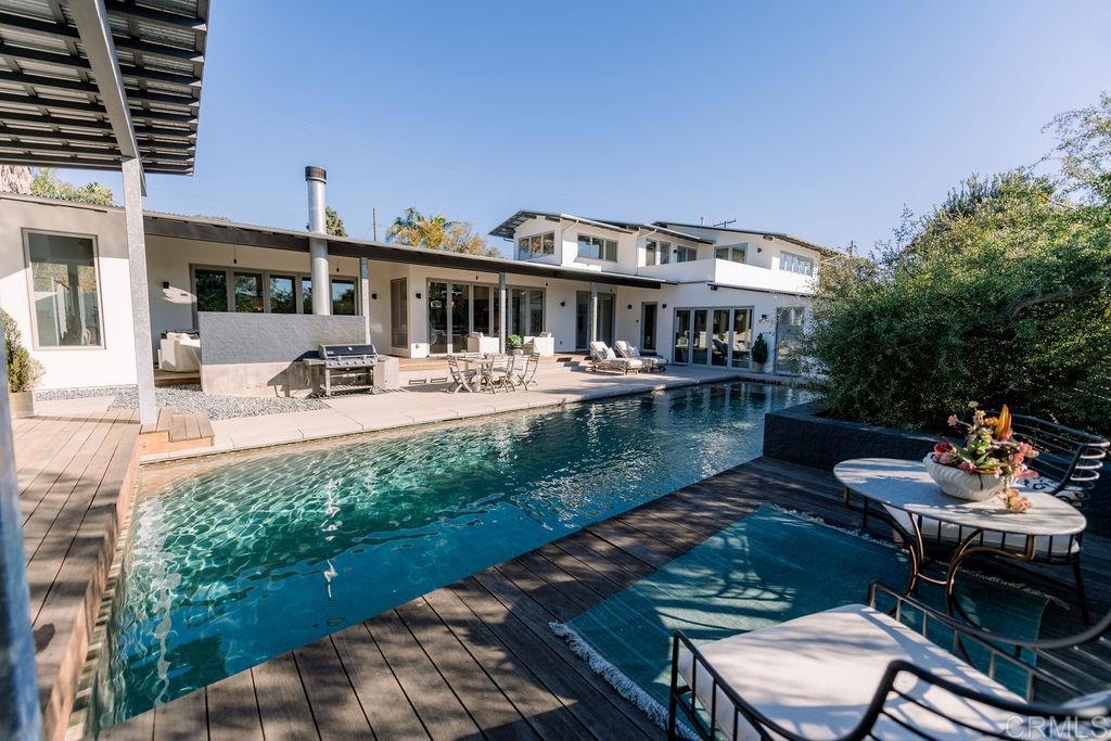1866 Sheridan Road Encinitas, CA 92024 - Photo 22 of 25 a view of a house with swimming pool and sitting area