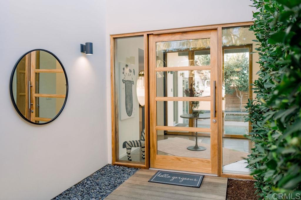 1866 Sheridan Road Encinitas, CA 92024 - Photo 4 of 25 a view of a livingroom with furniture and door