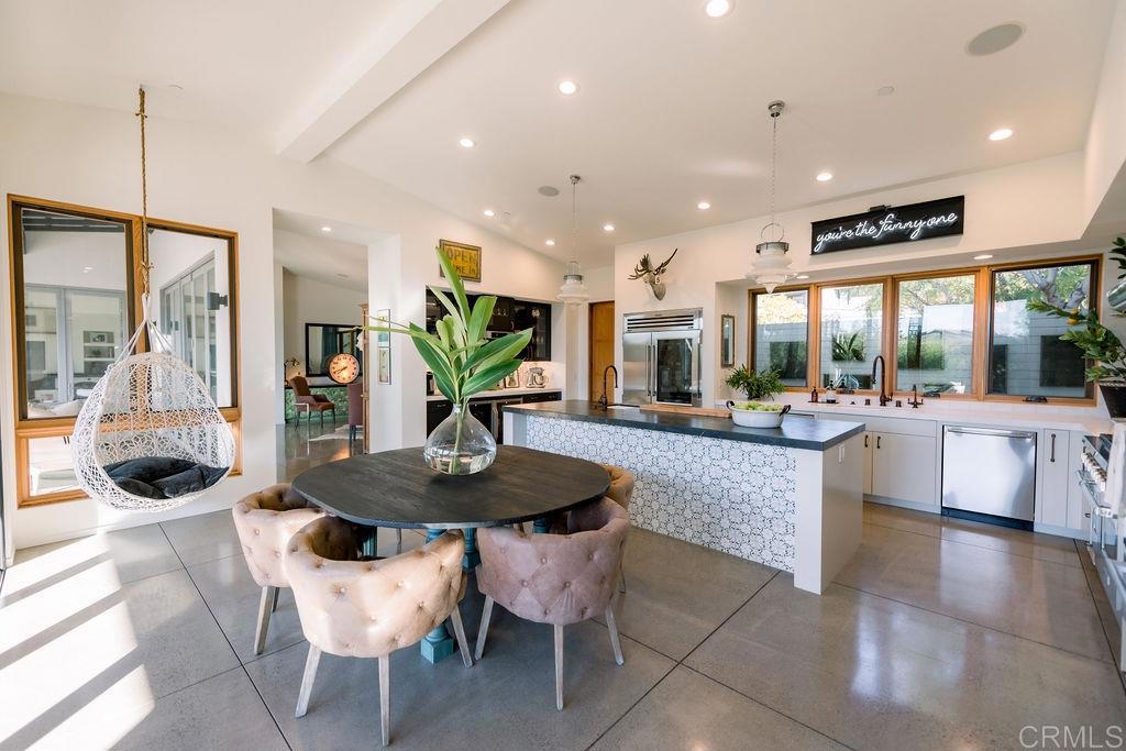 1866 Sheridan Road Encinitas, CA 92024 - Photo 6 of 25 a living room with furniture and a large window