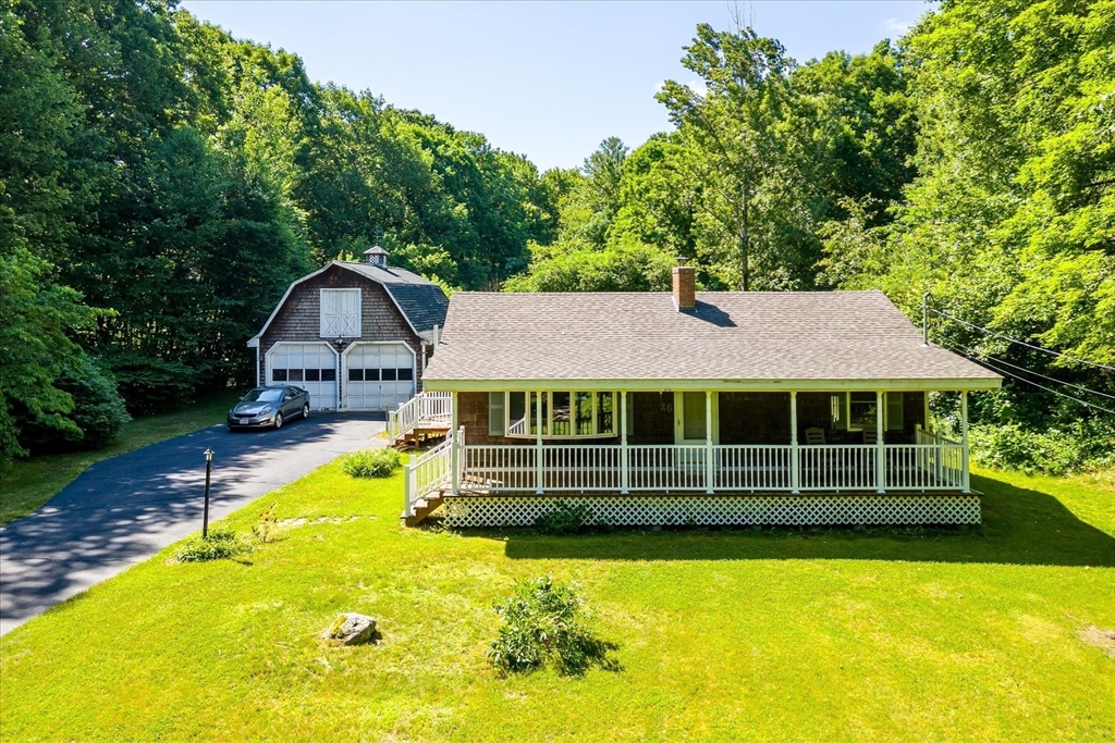 26 Bay Path Road Charlton, MA 01507 - Photo 1 of 38 a front view of a house with swimming pool