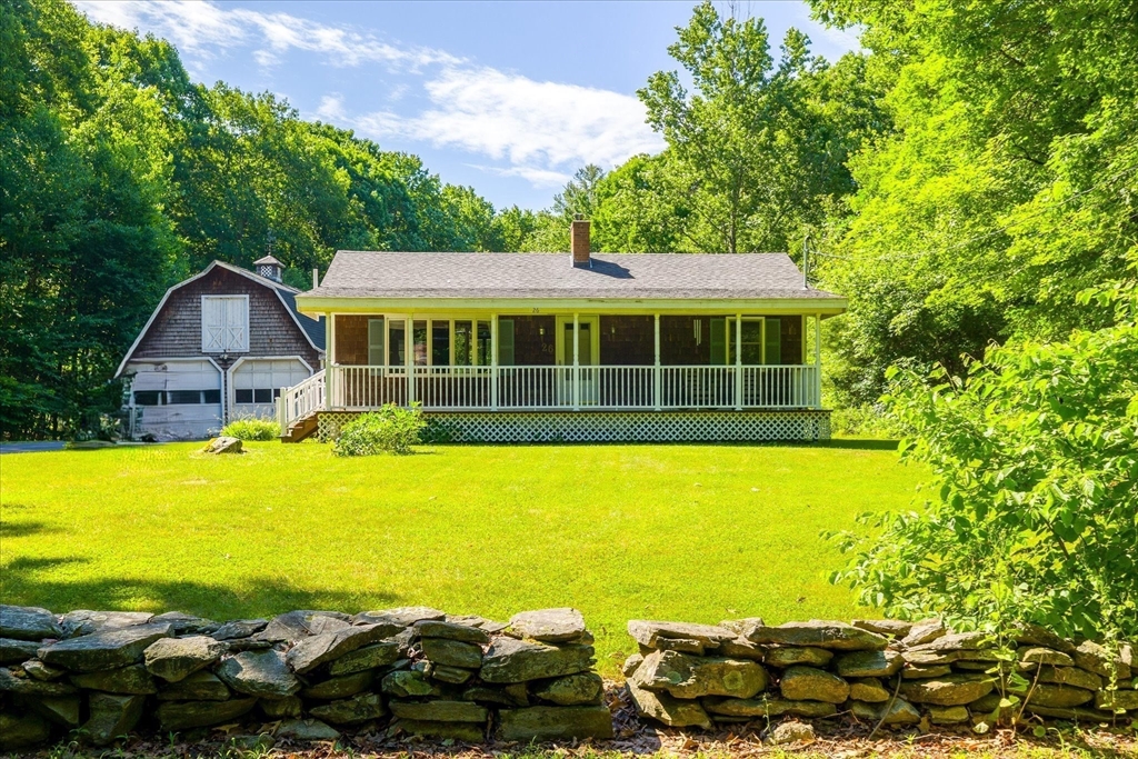 26 Bay Path Road Charlton, MA 01507 - Photo 22 of 38 a view of a house with a garden
