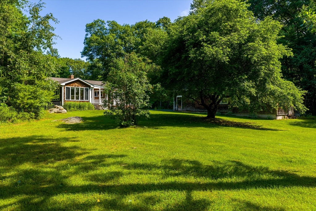 26 Bay Path Road Charlton, MA 01507 - Photo 27 of 38 a front view of a house with a yard