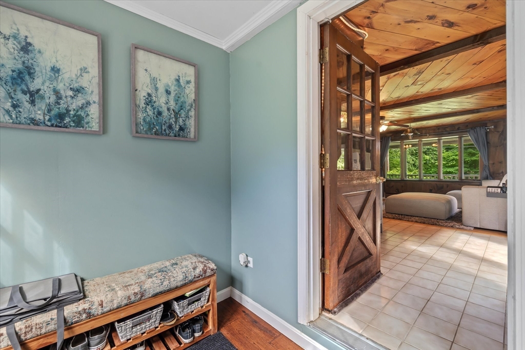 26 Bay Path Road Charlton, MA 01507 - Photo 3 of 38 a reading room with furniture and a window