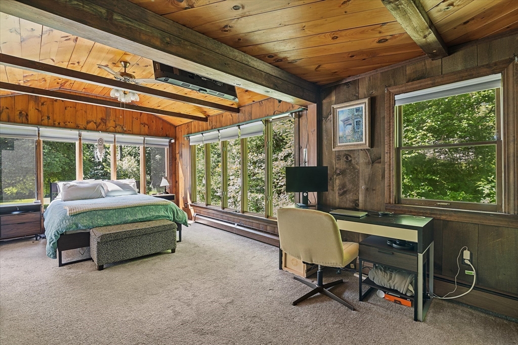 26 Bay Path Road Charlton, MA 01507 - Photo 10 of 38 a bedroom with furniture and a large window