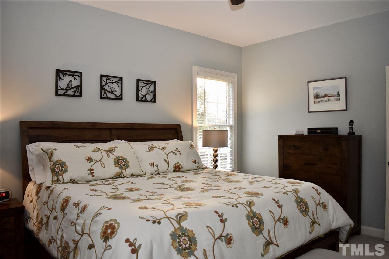 545 Lake Glad Road Wendell, NC 27591 - Photo 11 of 25 First-floor master bedroom suite. Beautiful new soft grey paint.