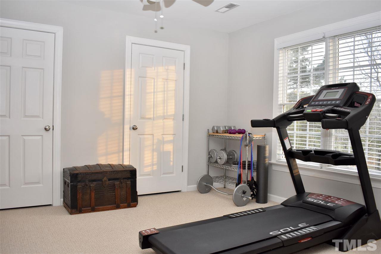 545 Lake Glad Road Wendell, NC 27591 - Photo 17 of 25 The first of 2 flex rooms upstairs with walk-in attic and closet.