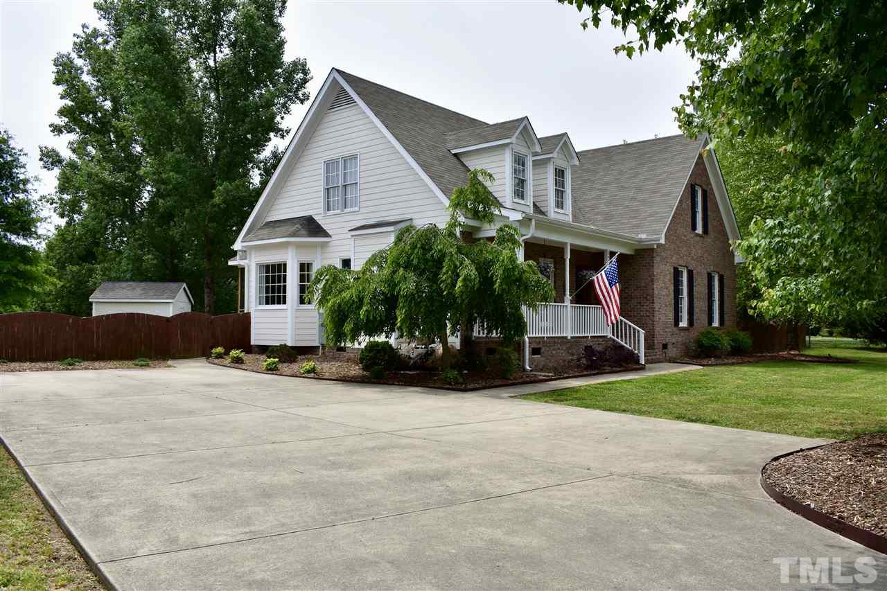 545 Lake Glad Road Wendell, NC 27591 - Photo 3 of 25 Extra long driveway with parking pads.