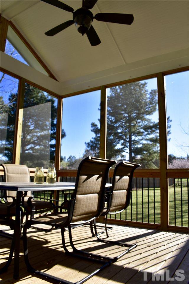545 Lake Glad Road Wendell, NC 27591 - Photo 22 of 25 Directly off the Breakfast Room, this fantastic screened porch is large enough for a table of 6.