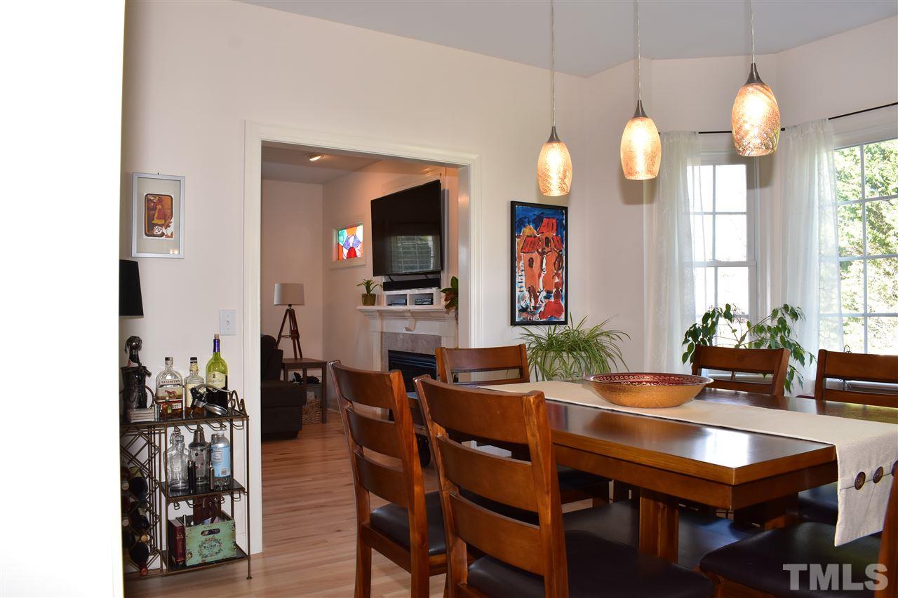 545 Lake Glad Road Wendell, NC 27591 - Photo 5 of 25 Chic pendant lights add ambiance to this formal dining room.