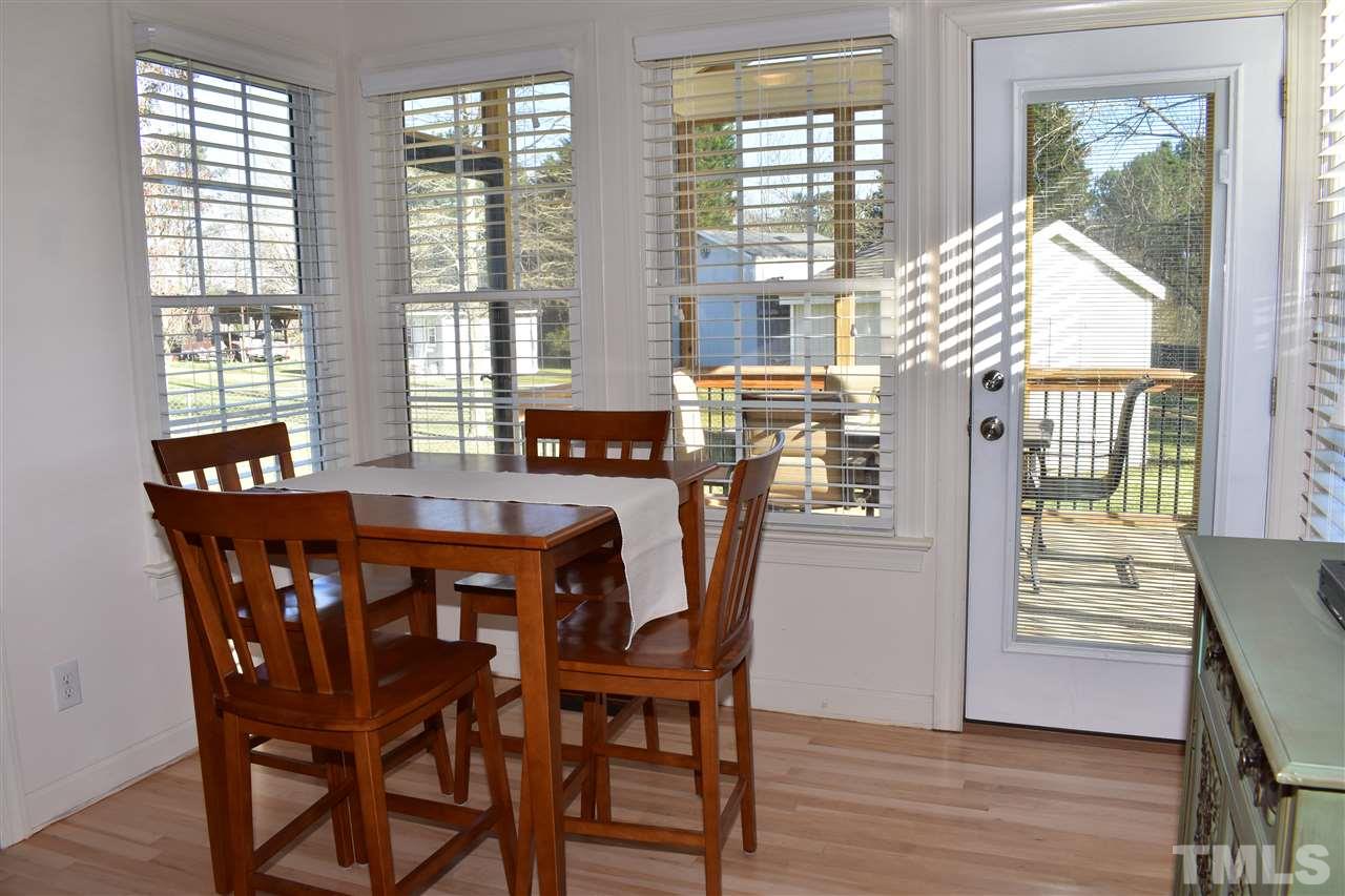 545 Lake Glad Road Wendell, NC 27591 - Photo 9 of 25 This breakfast room feels even larger with lots of windows and natural light.
