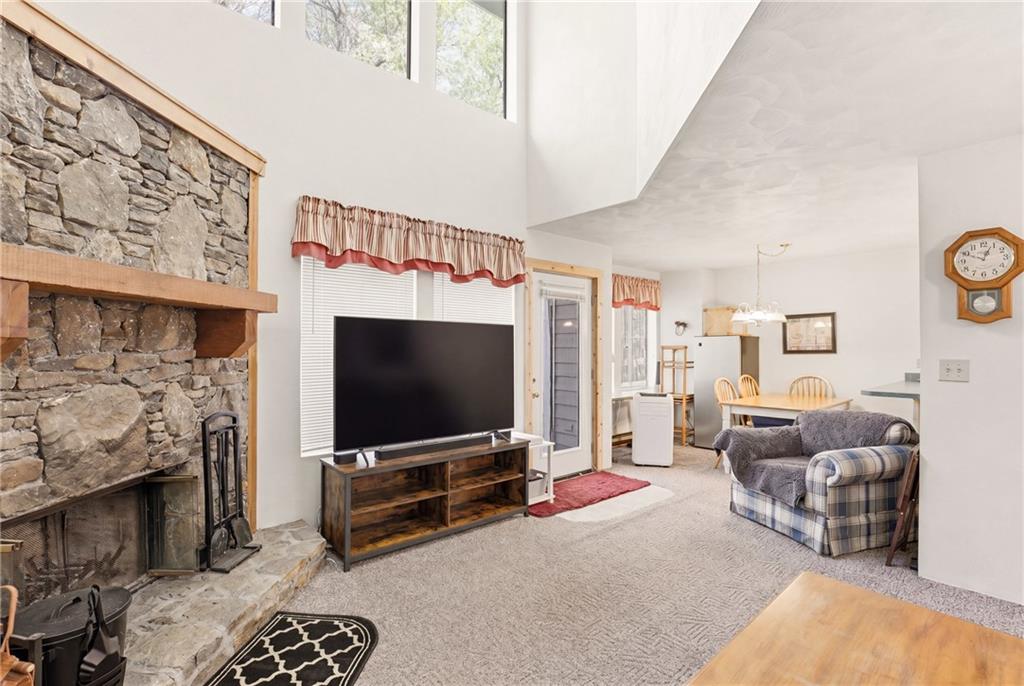 1627 Snowfield Way Hidden Valley, PA 15502 - Photo 11 of 38 a living room with furniture and a flat screen tv