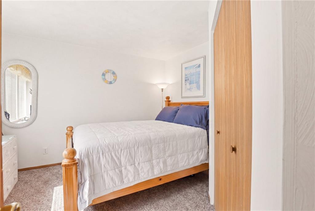 1627 Snowfield Way Hidden Valley, PA 15502 - Photo 16 of 38 a bedroom with a bed and painting on the wall