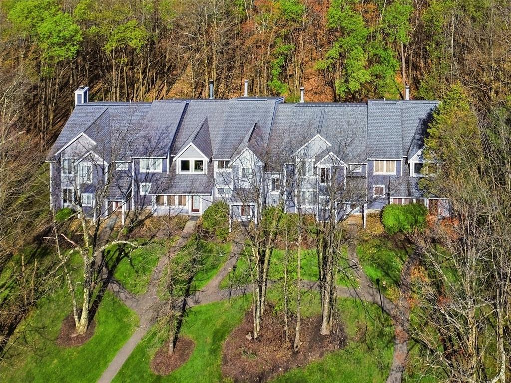 1627 Snowfield Way Hidden Valley, PA 15502 - Photo 30 of 38 front view of a house with a garden view